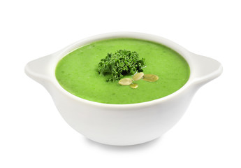 Tasty kale soup with pumpkin seeds isolated on white