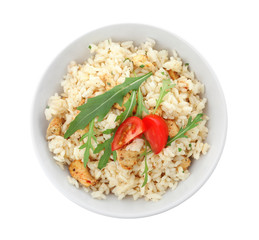 Delicious risotto with chicken isolated on white, top view
