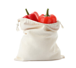 Cotton eco bag with bell peppers isolated on white