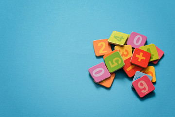 School background - numbers on blue background with copy space. Mathematics concept, math