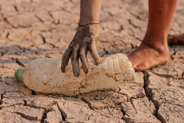 on dry ground, concept hope and drought