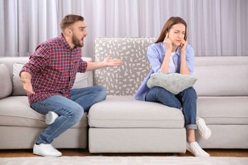 Couple having quarrel at home. Relationship problems