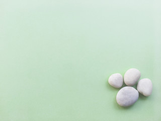 White stone spa on a green background