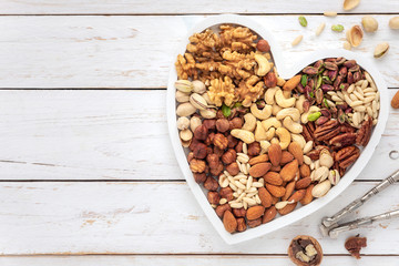 Assortment of various types of nuts - walnuts, cashew, hazelnuts,pine nuts, almonds, pecan and...