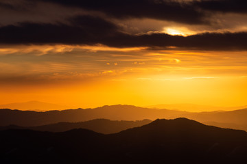 Sunset over mountains and valley