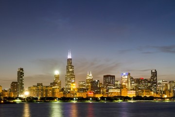 Beautiful view of Chicago skyline with waterfront at night, Illinois, USA