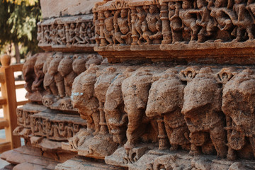 Closeup shot of the carvings of the Sun Temple in Modhera, Gujarat, India