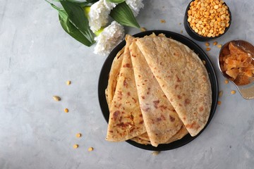  Holi Festival Food - Puran Poli is an Indian sweet flatbread stuffed with mixture of chana dal,...