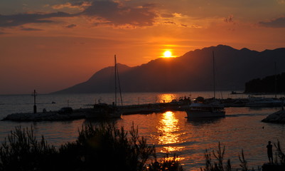 sunset on lake in Montenegro.