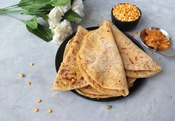  Holi Festival Food - Puran Poli is an Indian sweet flatbread stuffed with mixture of chana dal,...
