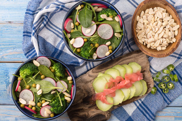 fresh vegetable and spinach salad on the kitchen table.
