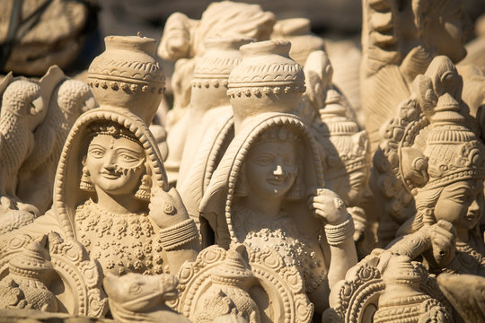 Paniharan Statue idol of indian women unpainted raw drying on sunlight