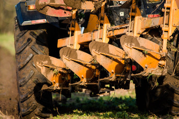 farmer plowing plan his fields close up