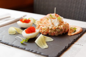 Russian salad with crab meat