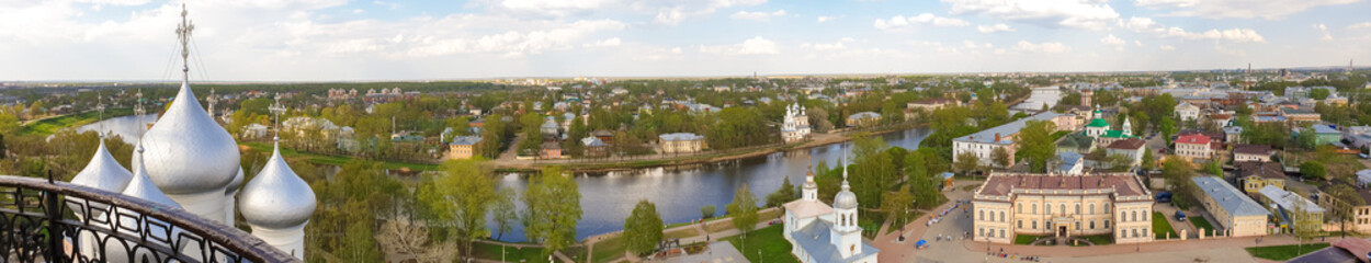 Fototapeta na wymiar Vologda river, panorama; a historical and modern part of the city. Spring. Sunny day.