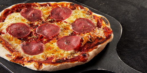 Crispy oven-fired Italian salami pizza