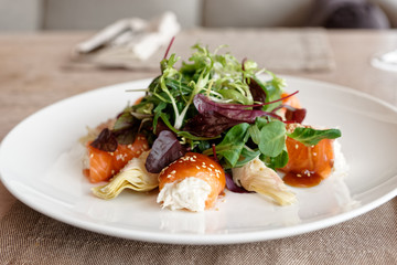 Salmon roll with crab meat stuffing