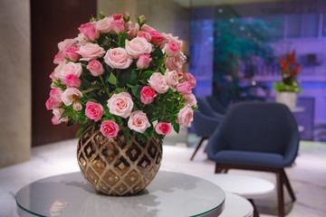 Blooming fresh flower bouquet on reception table background. Decorative Ornamental Flower, Nature, Valentine Day, Home Decoration, Bridal Wedding Reception, Floral Arrangement and Interior concept