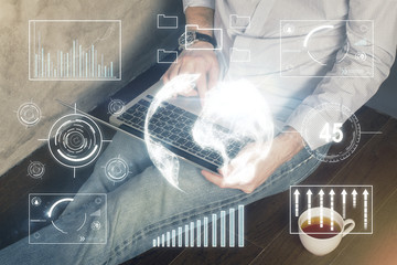 Forex graph with businessman working on computer in office on background. Concept of analysis....
