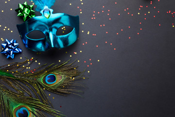 Elegant carnival mask with peacock feathers