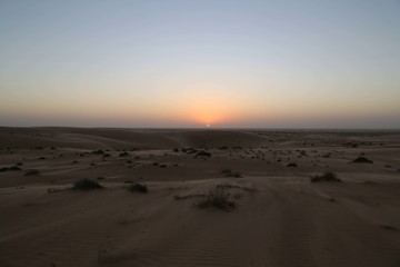 Fototapeta na wymiar The colors of the sunset in the Wahiba desert