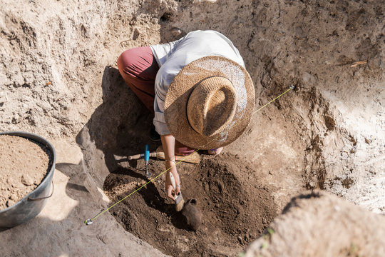 Archaeology - Archeologist Revealing Old Ceramic Object