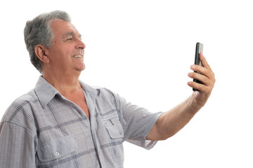 Old man smiling while face timing
