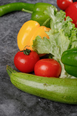 Vegetable mix with tomatoes, zucchini, pepper and lettuce.