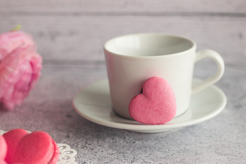 Macaroons. Delicious french dessert. Macaroons are made in the shape of a heart. Romantic composition. Great for Valentine's day or romantic design.