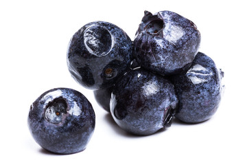 a handful of blueberries close-up isolated on white background
