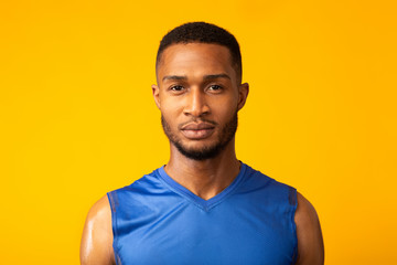 Front view portrait of determined black sportsman