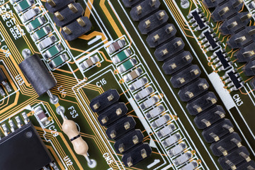 High tech technology geometric background with printed circuit board and many electronic...