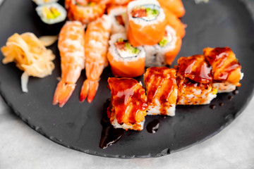 Rolls with salmon, shrimp and caviar