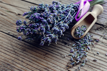 Bunch of lavender flowers on a wooden background