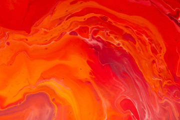 Vibrant red colors stains of liquid acrylic colors