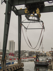 crane for boats in marina