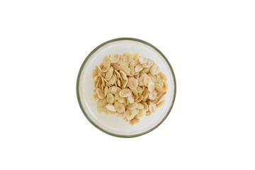 Organic watermelon seed plane shape into the glass bowl. Isolated on White Background. Top view and clipping path.