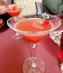 red cocktail on table