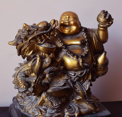 Brass sculpture of Laughing Buddha 