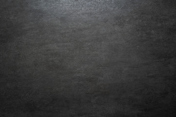 Obraz premium dark gray concrete stone wall with light gradient and copy space