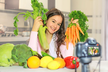 Teenage blogger explains to her followers how to eat healthy. Concept of communication among young...