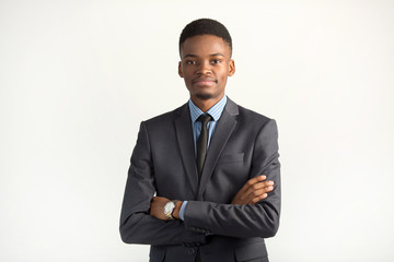 handsome african man in a suit on a white background
