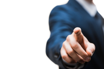 cropped view of businessman in suit pointing with finger isolated on white