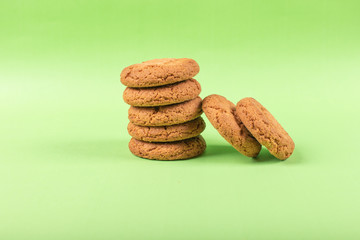 Biscuits on table with green background