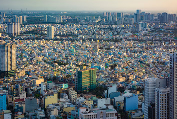 Ho Chi Minh City, Vietnam - CIRCA Jan 2020: Saigon (Ho Chi Minh) aerial cityscape, as seen from Bitexco Financial Tower at sunset.