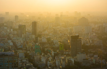 Ho Chi Minh City, Vietnam - CIRCA Jan 2020: Saigon (Ho Chi Minh) aerial cityscape, as seen from Bitexco Financial Tower at sunset.