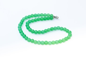 Green nephritis beads isolated on white background