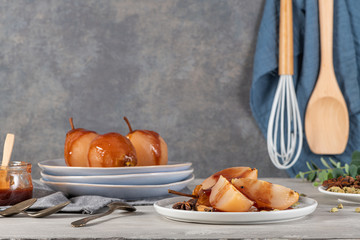 Poached pears delicious home made recipe over light kitchen countertop