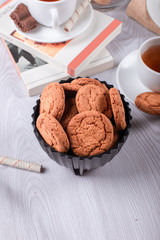 sweet snacks and book on the table