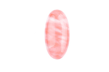 Pink cabochon stone on a white background, costume jewelry